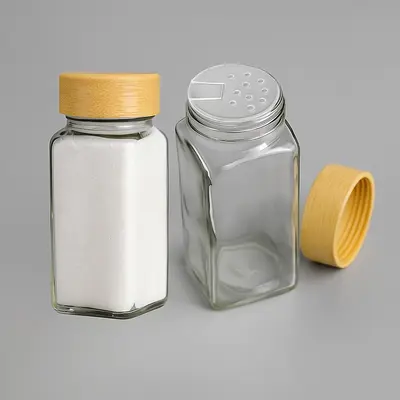 מלחיה/תבליניה/צנצנת זכוכית מכסה במבוק דו מצבי 4.5*4.5 ס"מ